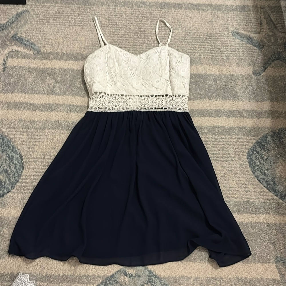 Super cute navy and white dress.